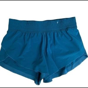 Teal color lululemon shorts. I think they are find your pace shorts, 3 inch.
